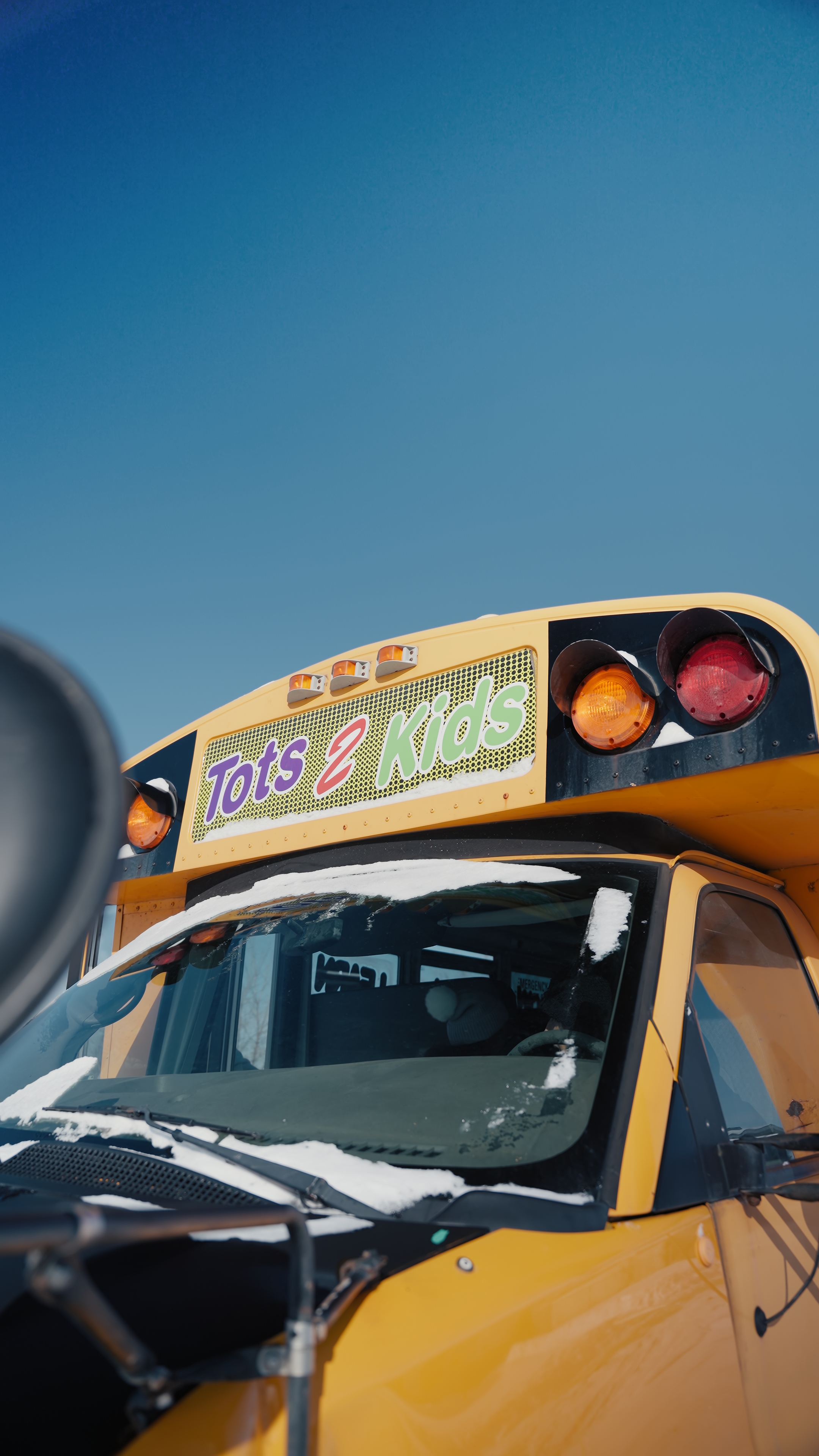 Tots 2 Kids branded school bus