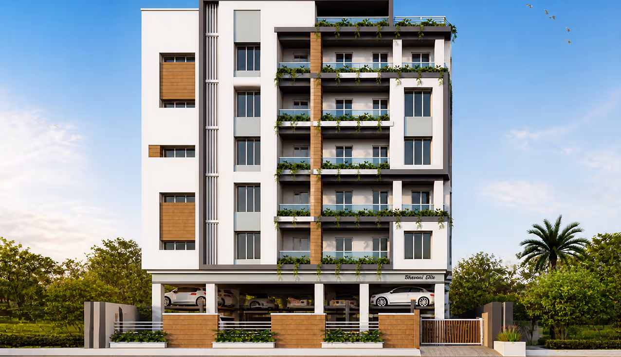 Modern white multi-story residential building with balconies decorated with plants and ground-level parking.