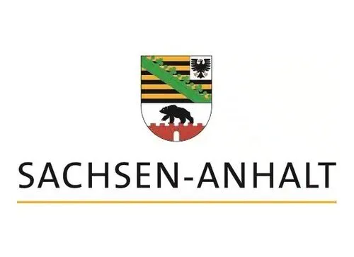 Wappen von Sachsen-Anhalt über dem Text 'SACHSEN-ANHALT' mit einer gelben Linie darunter.