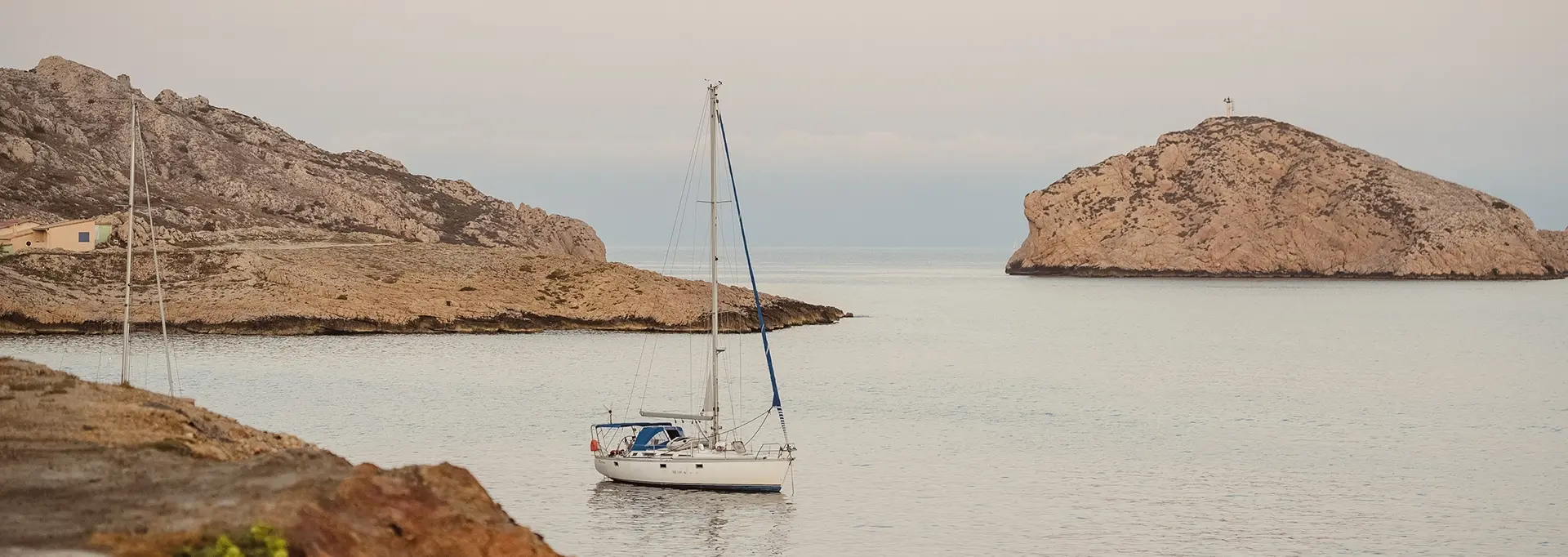 Soléo Prado, boat on the water in Marseille, maritime scene near the Old Port and the coastline.