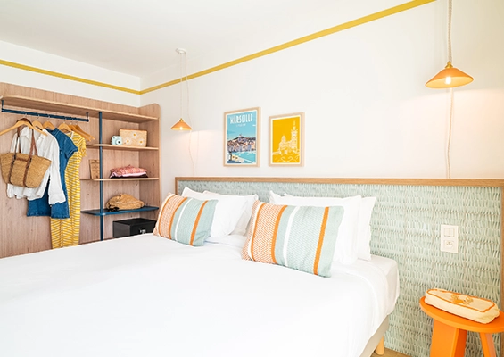 Soléo Prado, bed in a hotel room in Marseille Prado, modern comfort in the Prado district near the beaches.