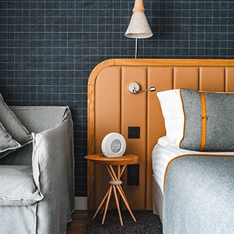 lit dans une chambre hotel heliopic Chamonix Mont-Blanc