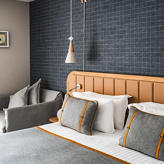 un lit chambre hôtel heliopic Chamonix Mont-Blanc