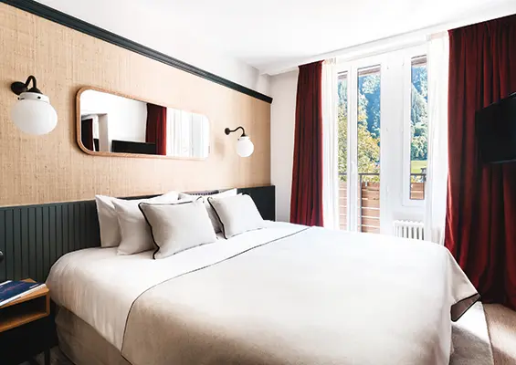 Chambre communicante avec lits superposés vue du lit double