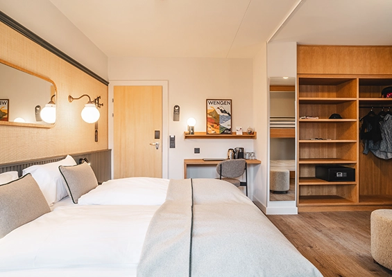 Chambre familiale lit au Braunbär hôtel à Wengen