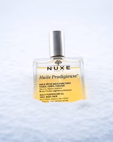huile prodigieuse nuxe dans la neige