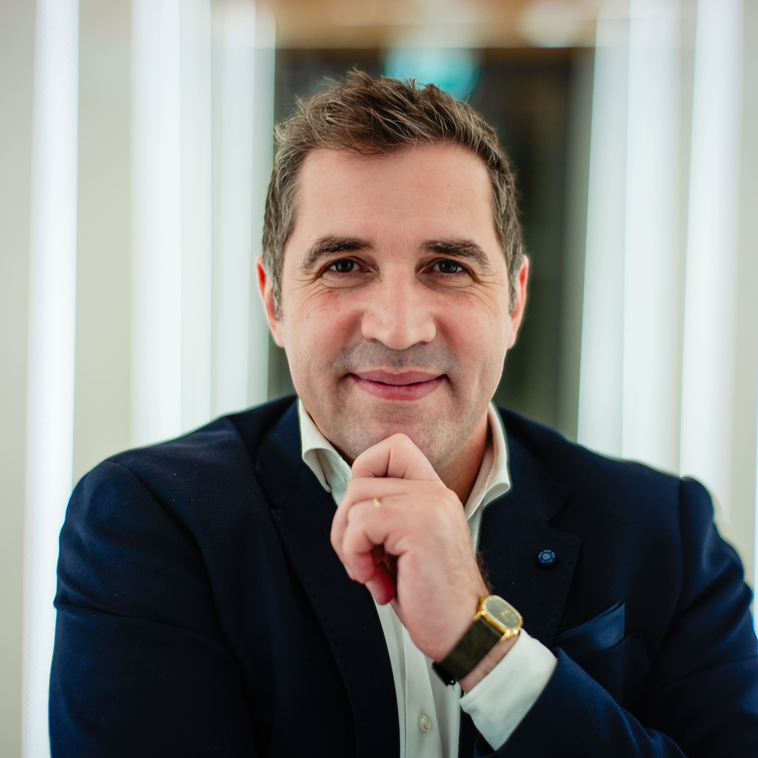 image of a diverse group of professionals in a meeting room for a digital marketing & advertising agency