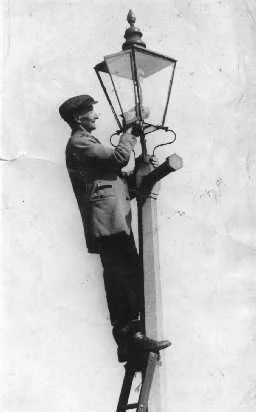 A lamplighter was a common role in 19th century cities