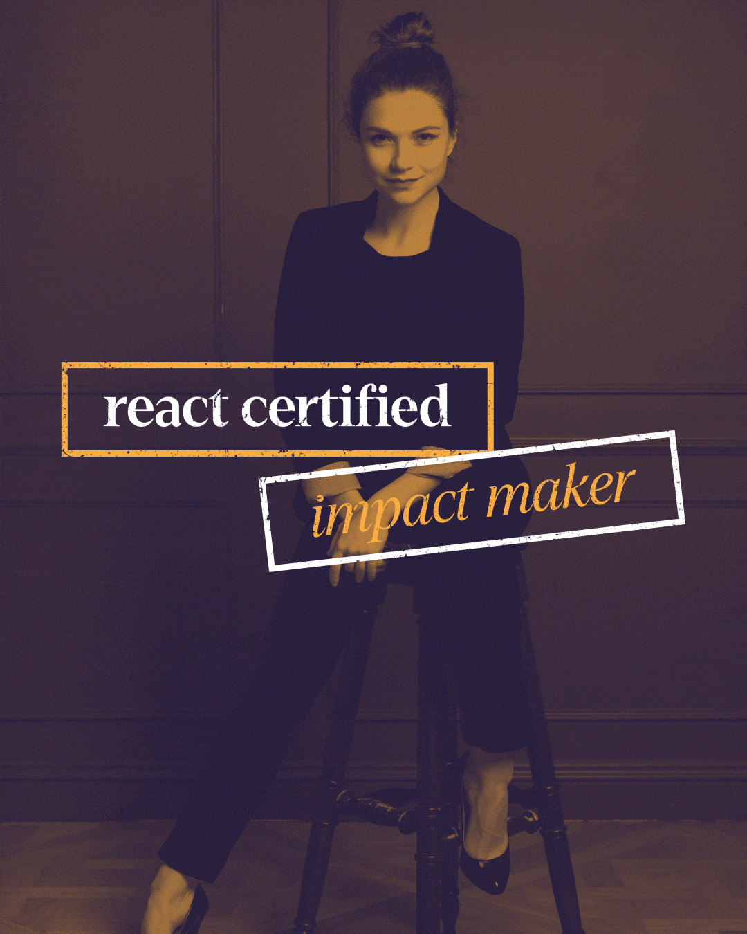 Smiling family of four sitting closely together, looking happy and relaxed at home.