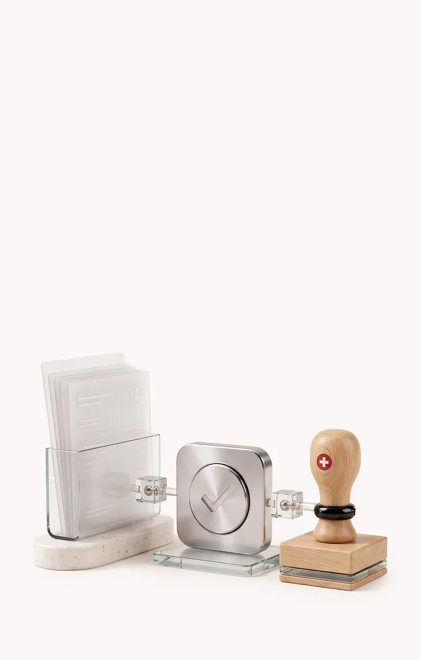 Modern office desk set with transparent card holder, metallic checkmark stamp, and wooden stamp with red cross.