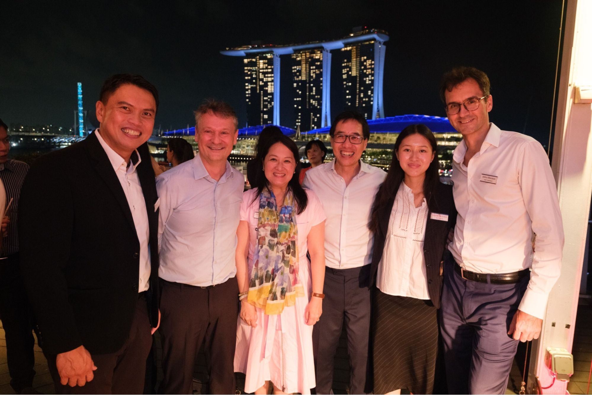 Guests on the terrace, Marina Bay Sands at night