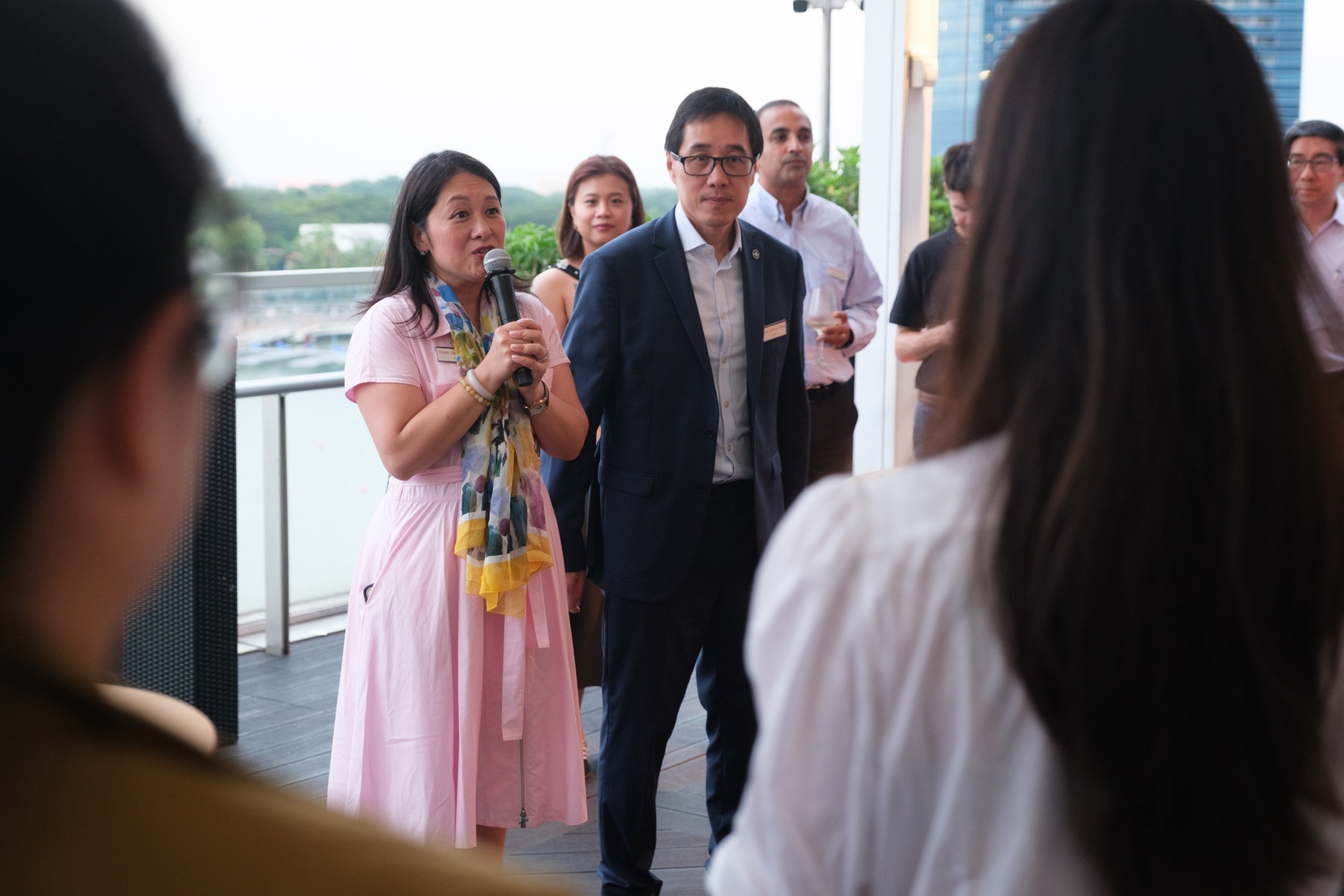 Welcome remarks to guests on the terrace at Lantern