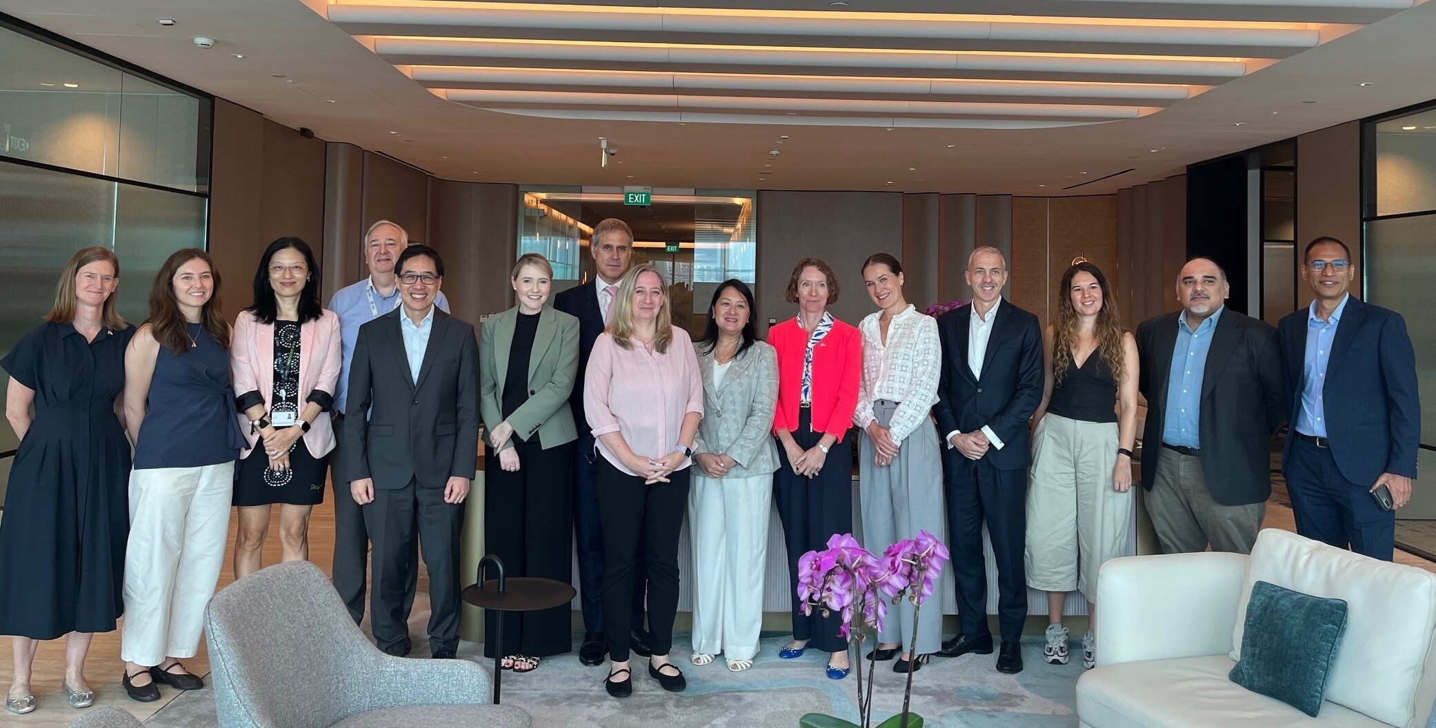 Participants seated around the roundtable in Singapore