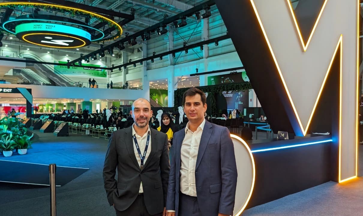 A panel discussion on stage at Money20/20 Middle East