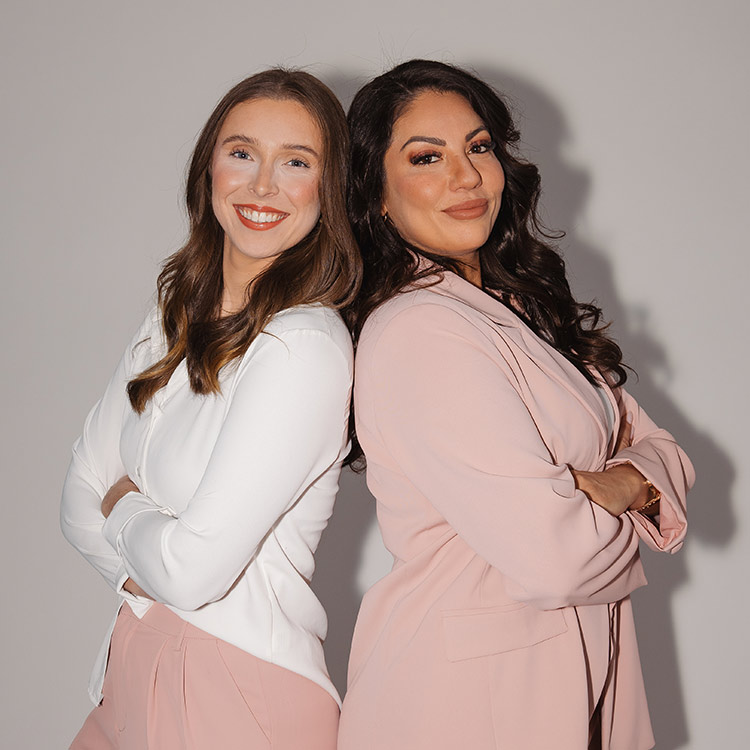 Natalie and Grace posing during a content creation session for The Social Circle.