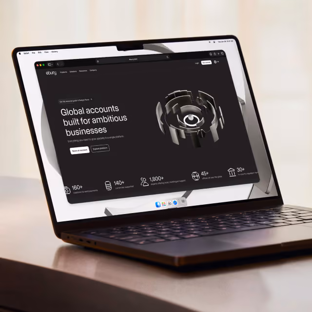 Ebury website homepage design shown on Macbook - financial services website project by Nath&Co