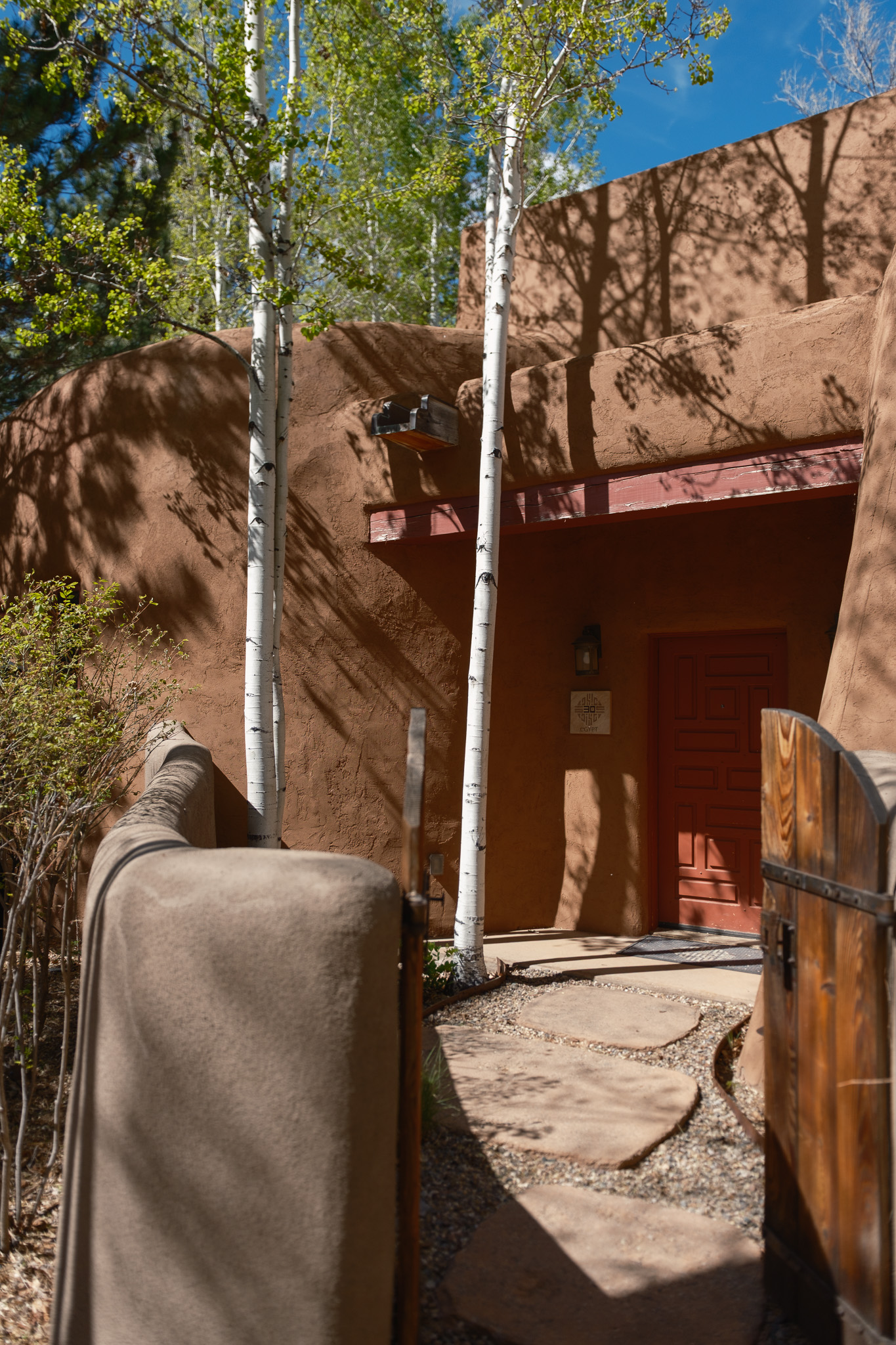Adobe architecture and grounds at El Monte Sagrado in Taos, New Mexico
