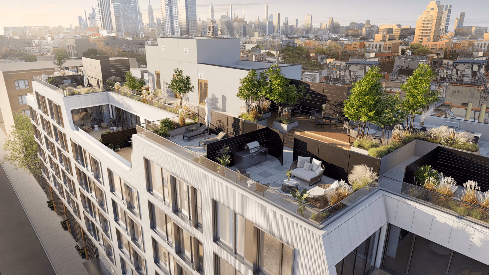 Modern rooftop terrace with outdoor seating, lounge chairs, plants, and a barbecue grill overlooking a city skyline.