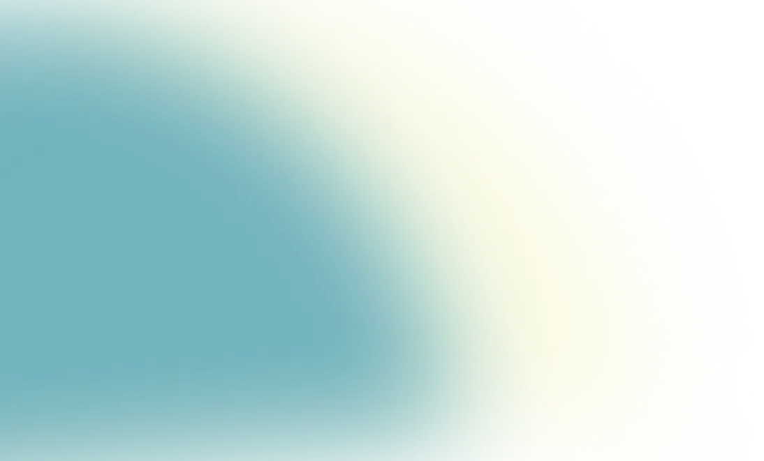 Soft gradient background with blurred light yellow and peach tones fading into black.
