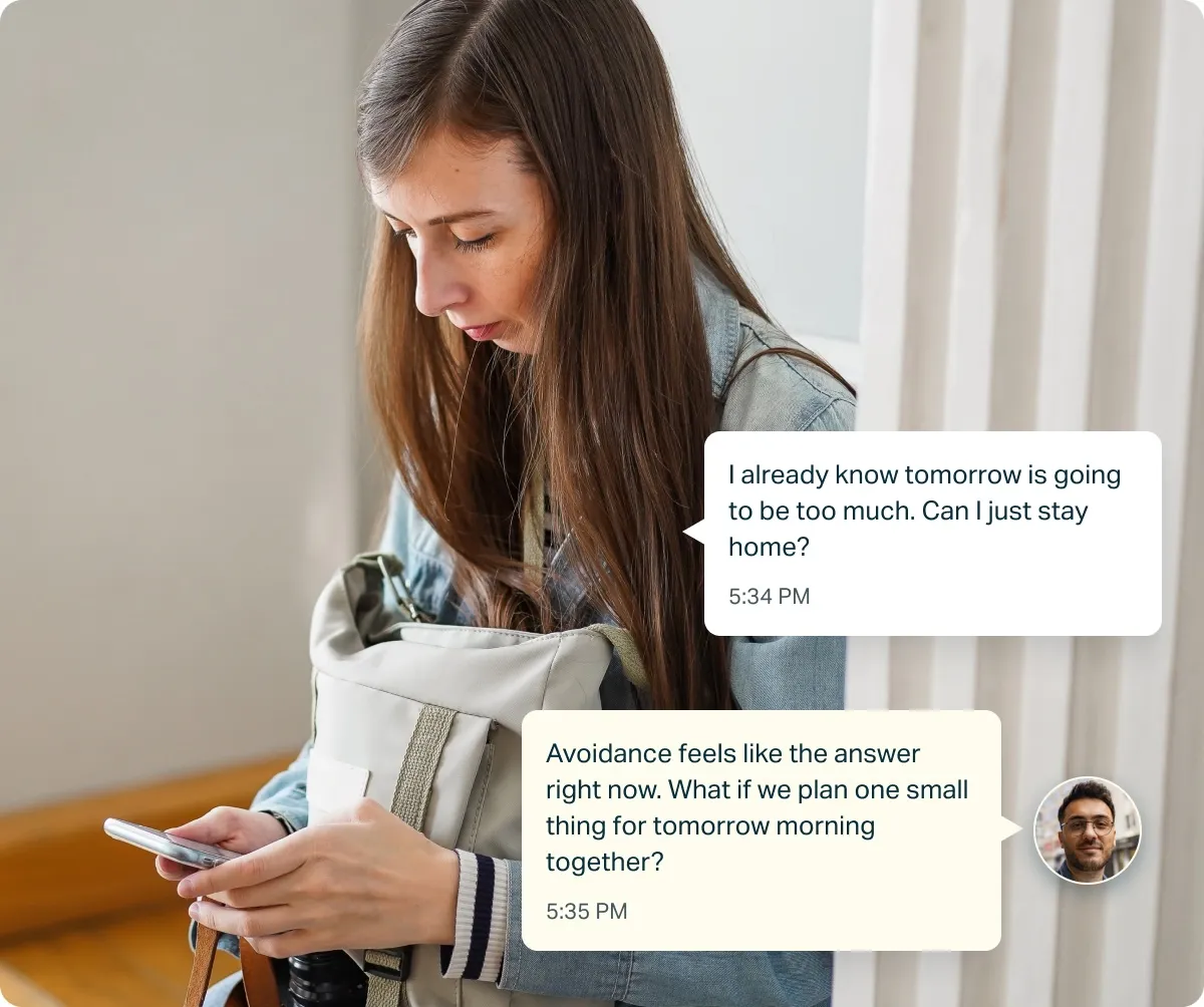 Young woman sitting in a chair looking at her phone with text messages discussing resisting the urge to check due to OCD.