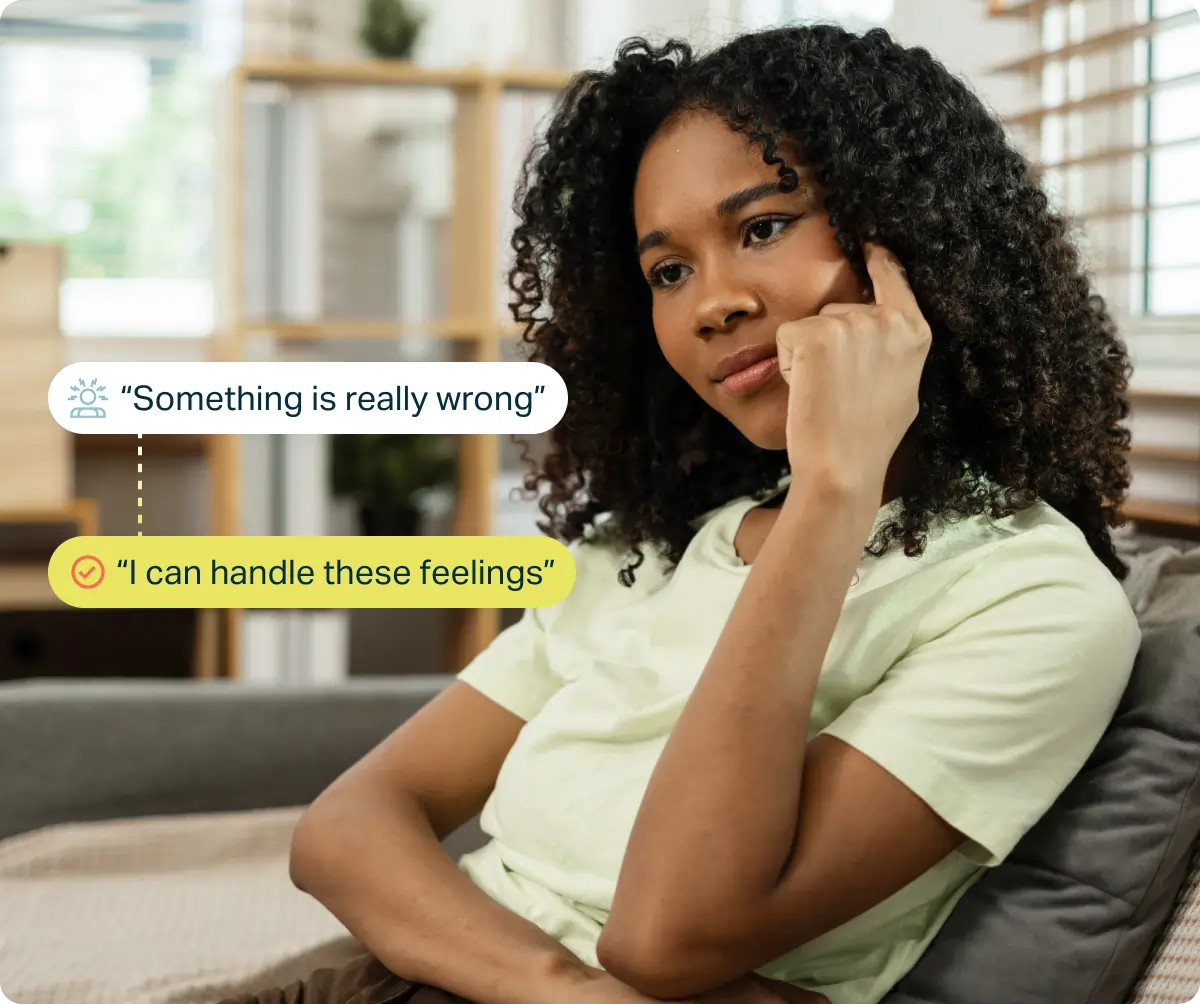 Young woman sitting on couch, with text bubbles showing self-talk, emphasizing positive mindset.