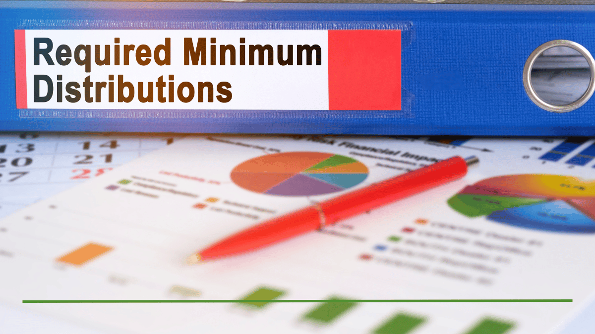 Required Minimum Distributions binder next to a financial report with pie charts and a calendar, representing 401k RMD planning at age 73