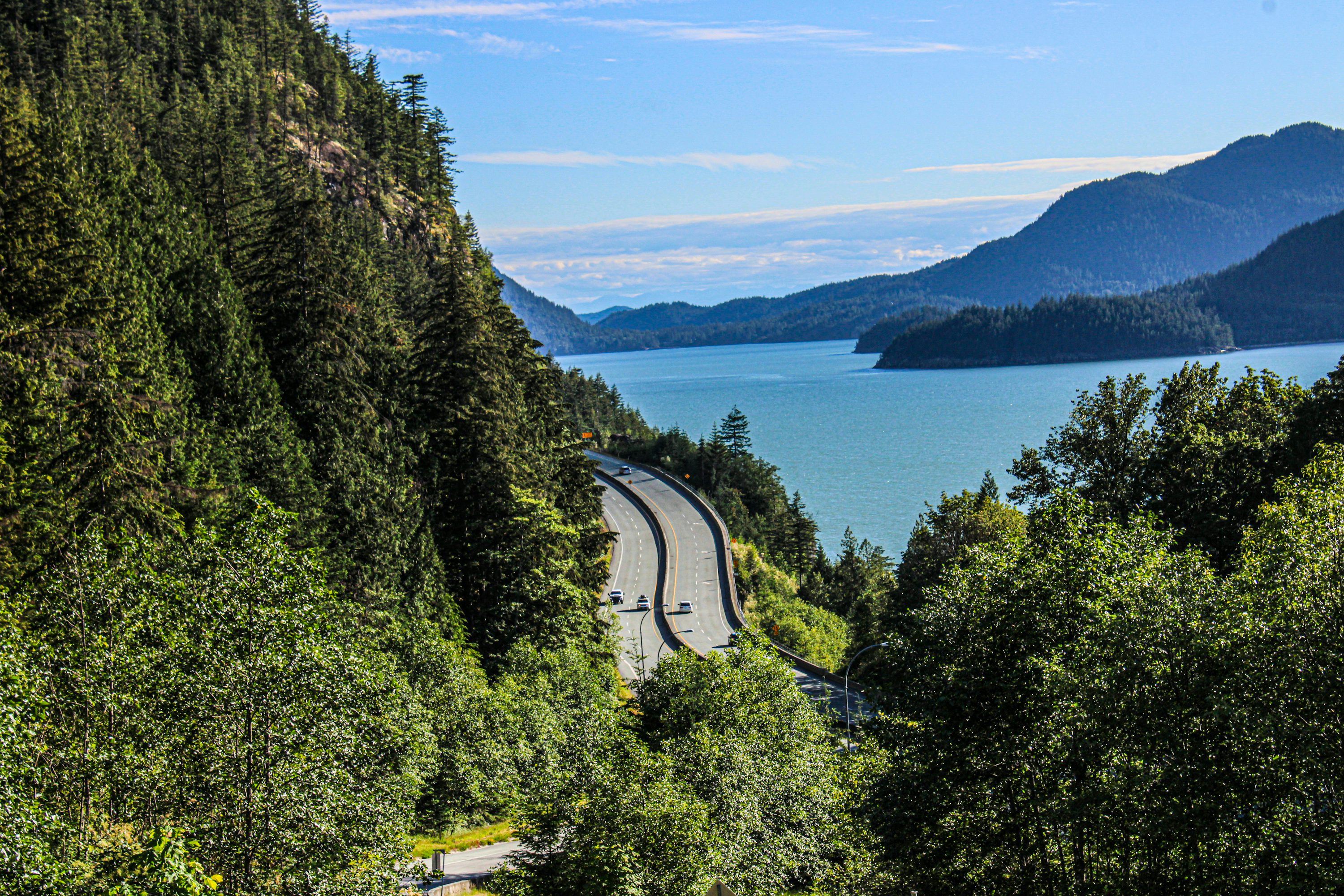 Coastal road, mountains and water at Howe Sound, British Columbia