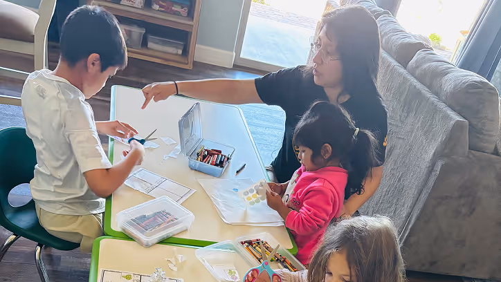 Teacher teaching preschool