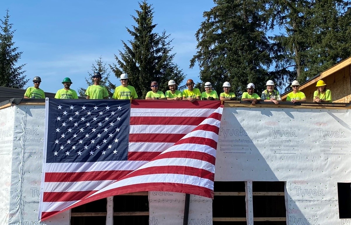 American flag flying at a Dawson Construction project site — Riverview