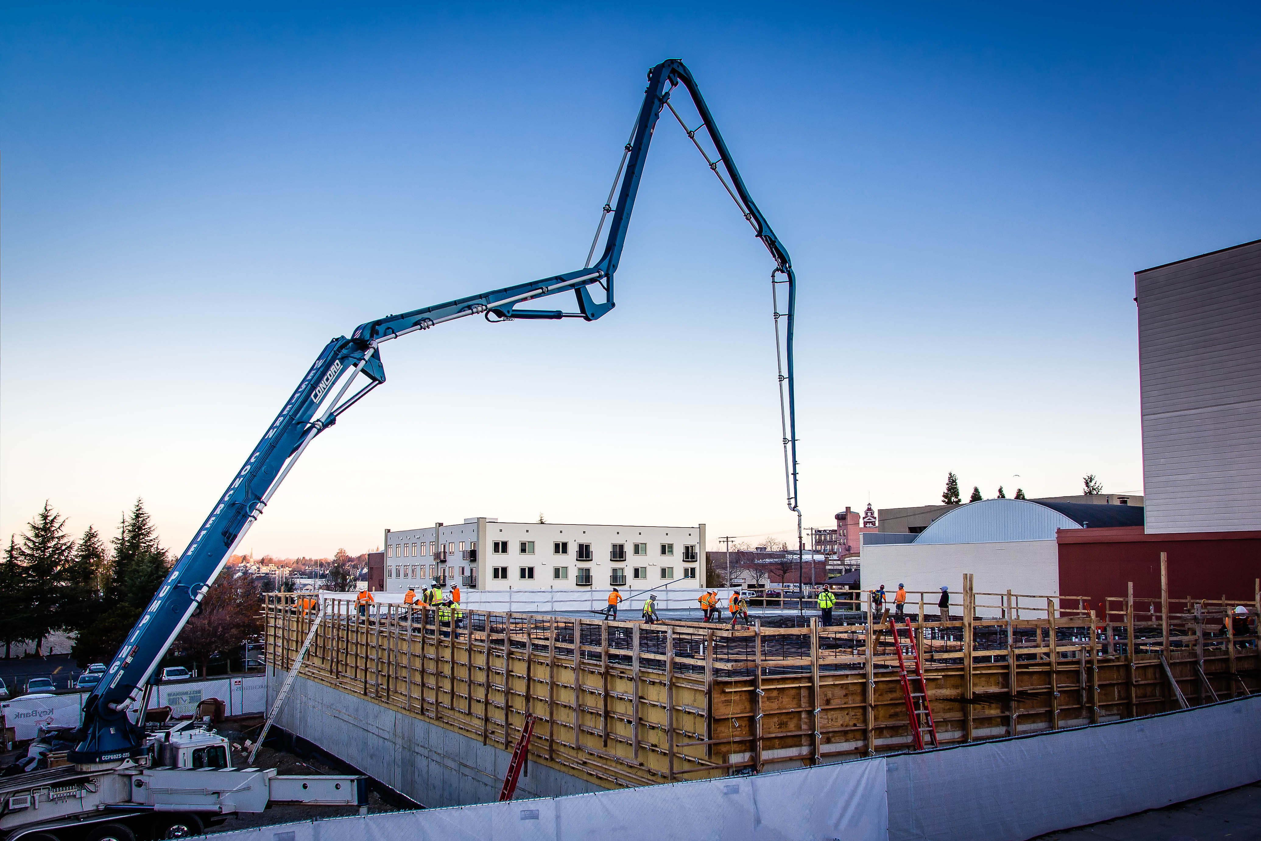 Dawson carpenters and roofers working framing and exterior envelope on a Northwest Washington jobsite