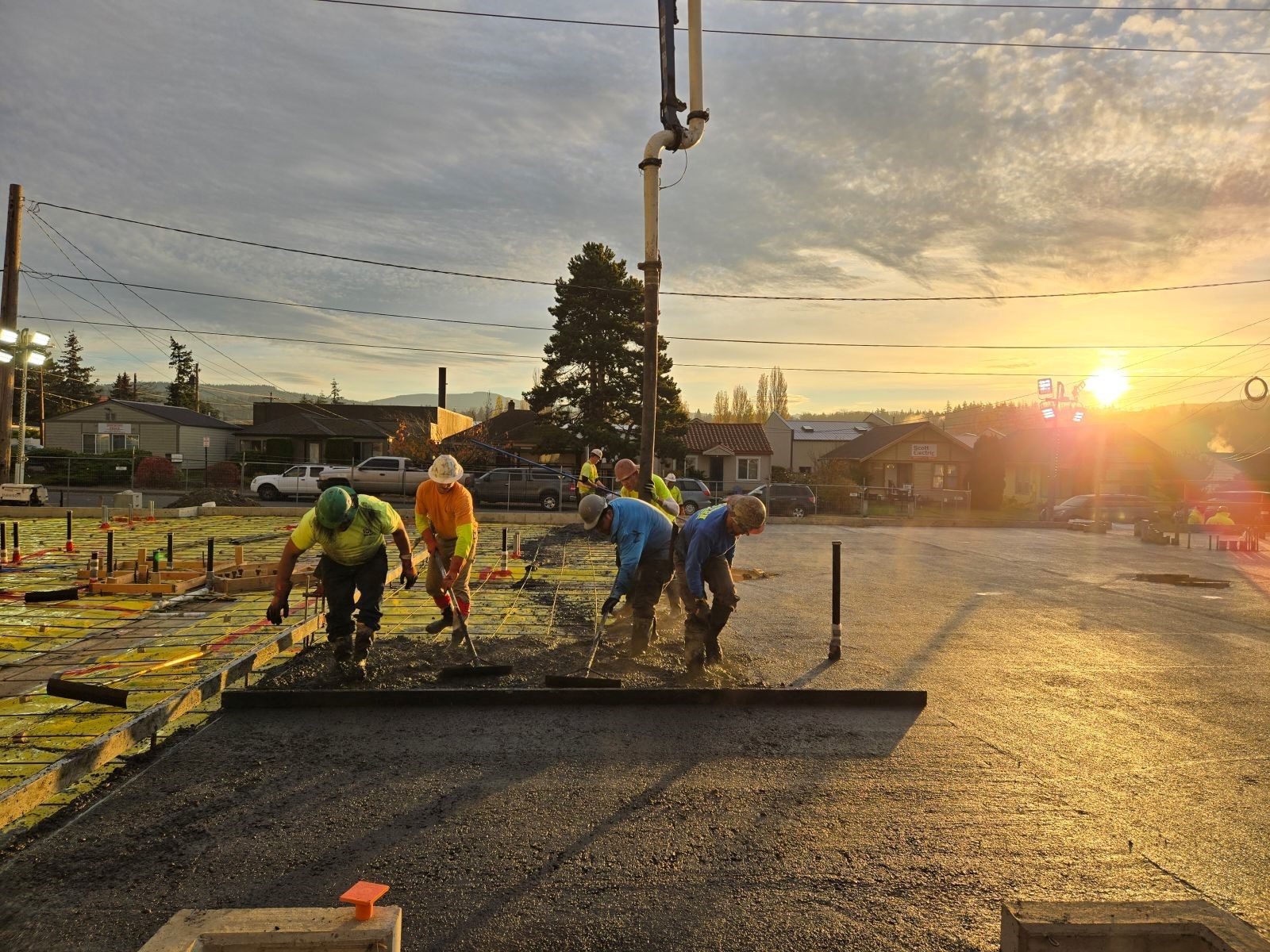 Dawson crew self-performing a concrete pour at golden hour