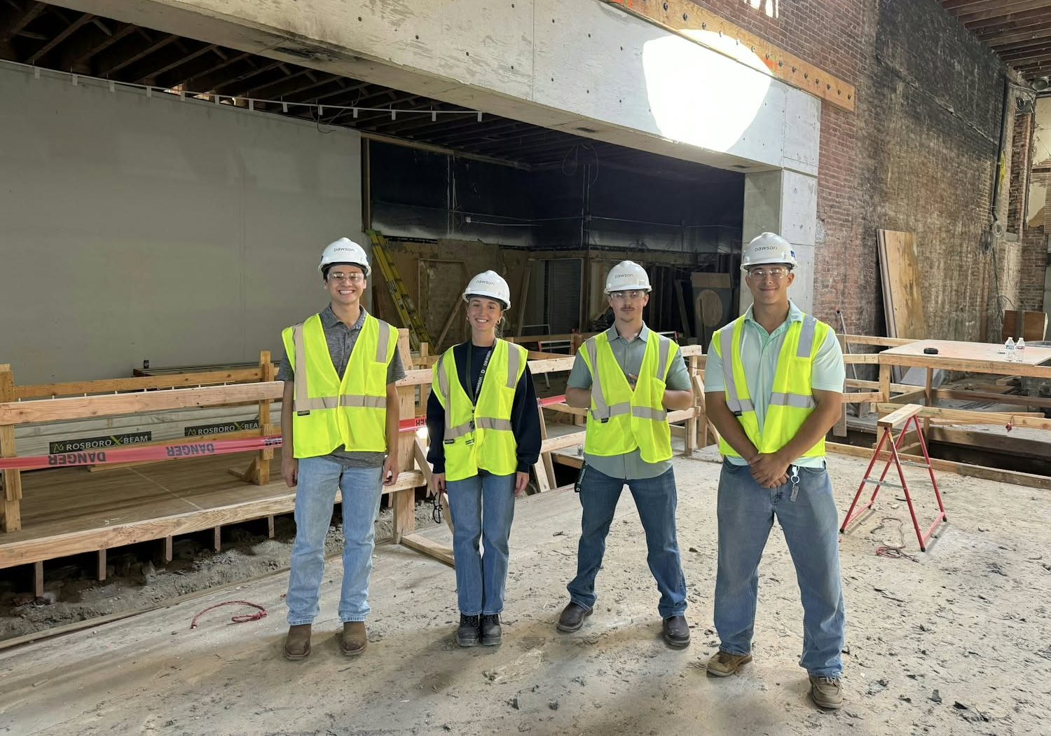 Dawson apprentices on an active jobsite