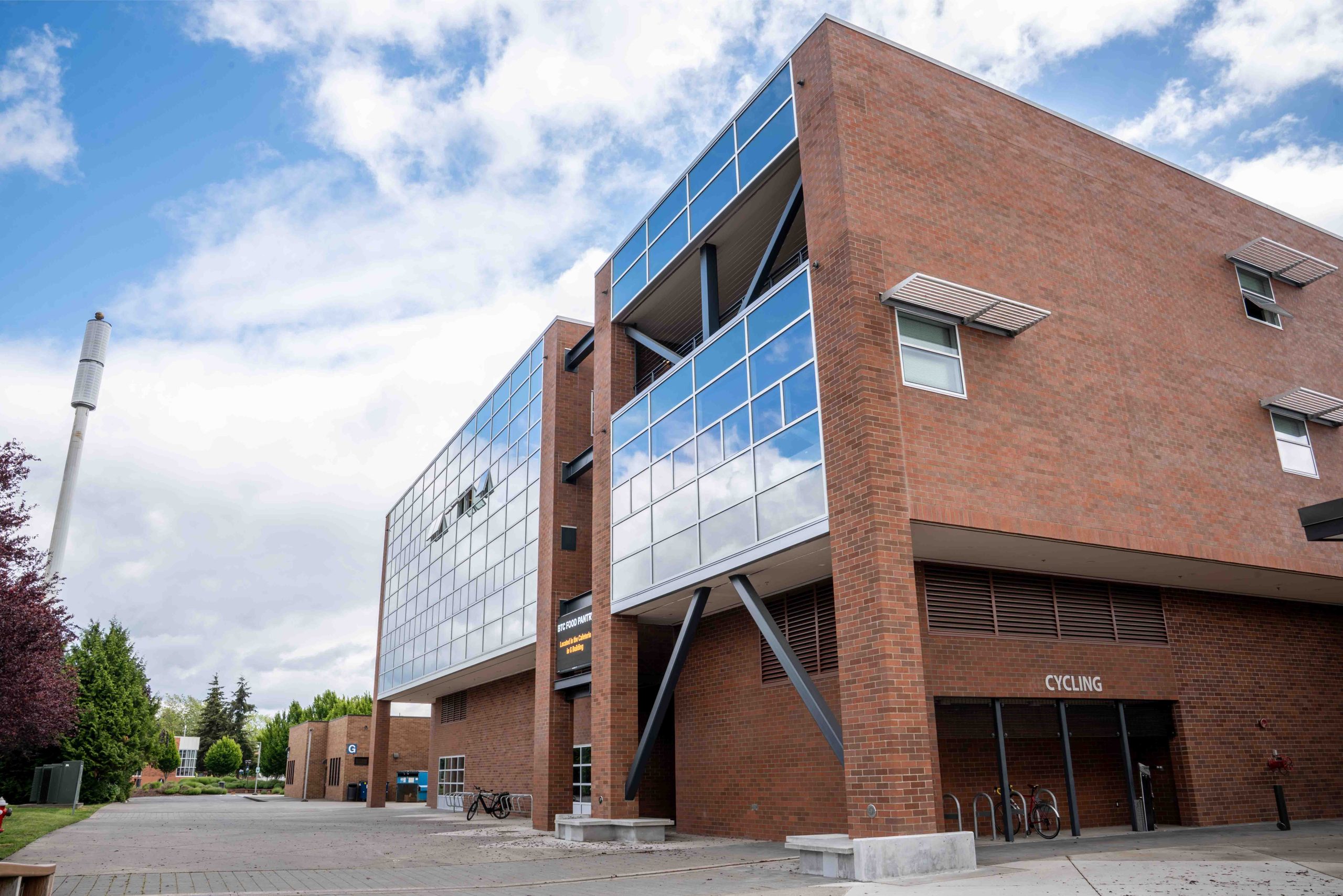 Campus Center exterior with brick and glass curtain wall at Bellingham Technical College
