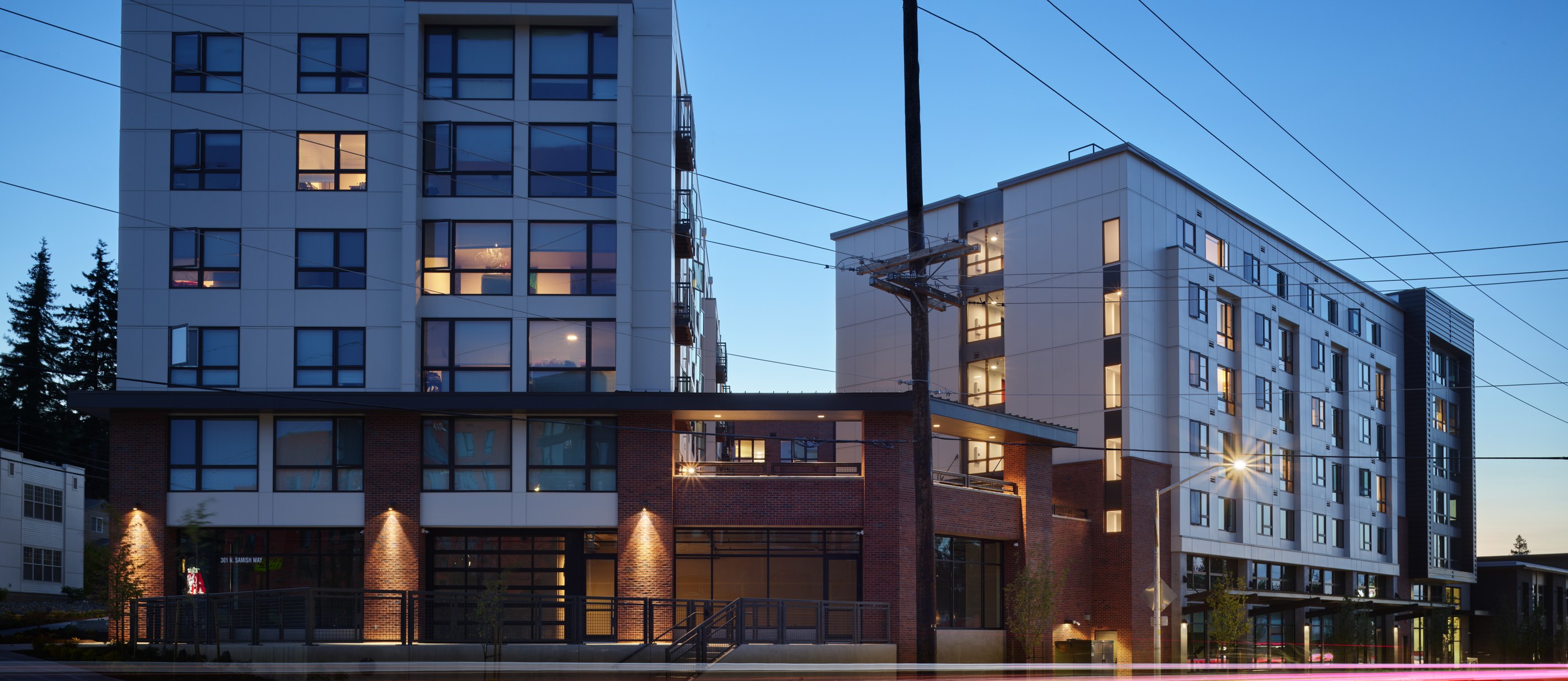 Samish Commons completed affordable housing buildings at dusk in Bellingham, Washington