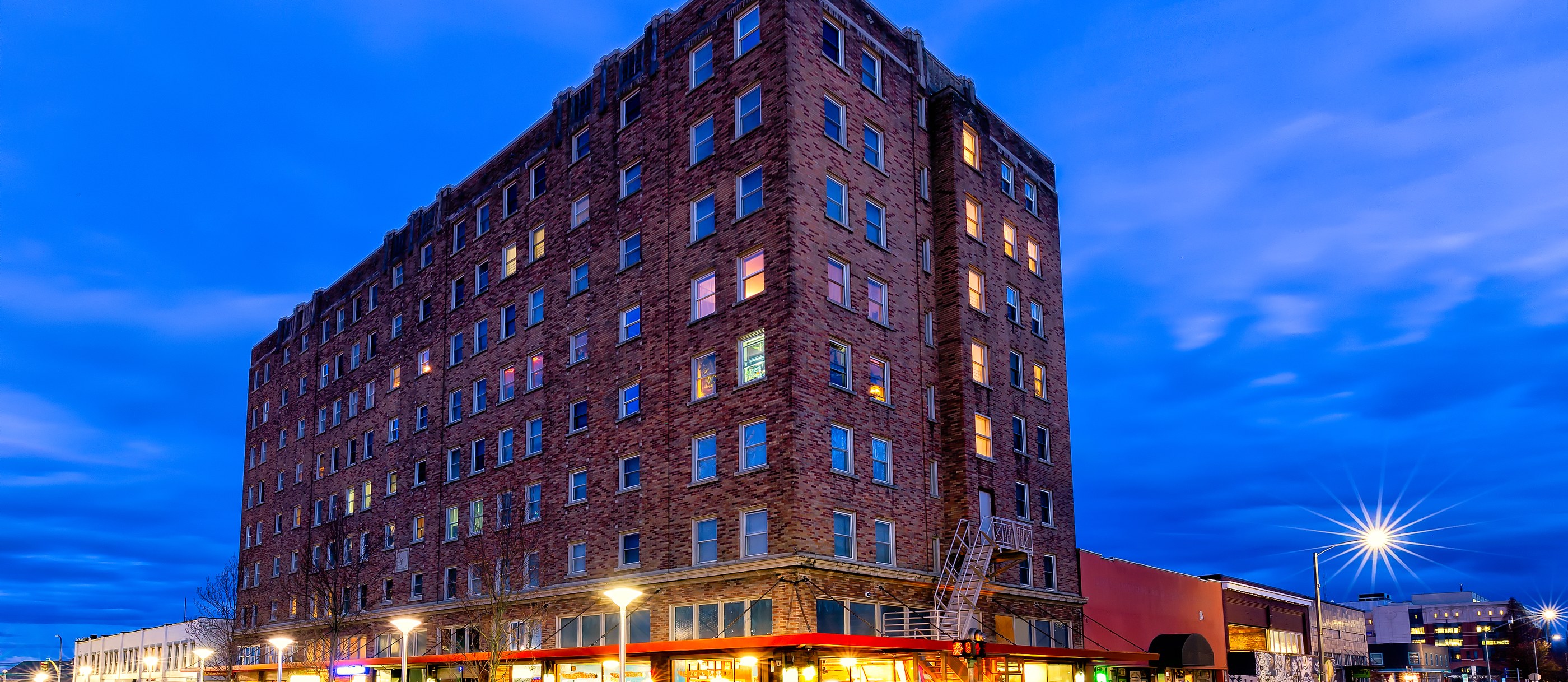 Mt. Baker Apartments historic brick building at dusk, Bellingham