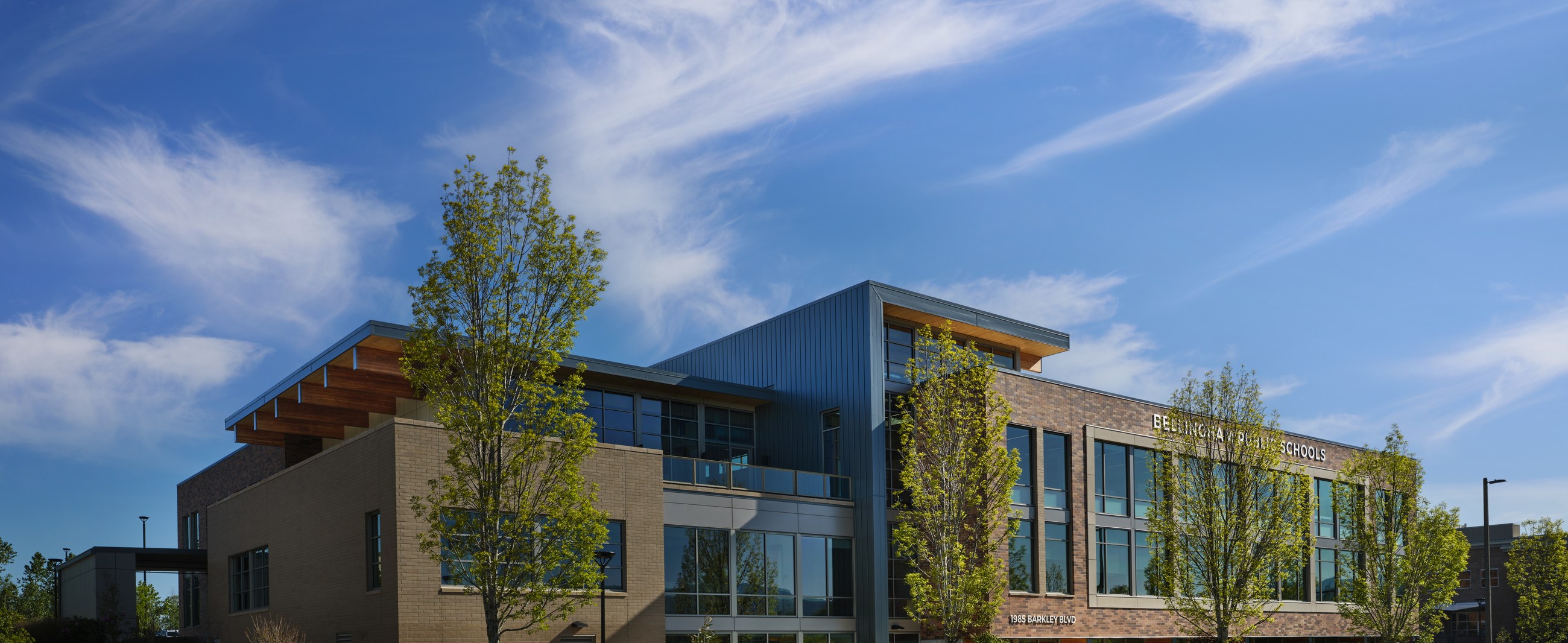 District Office Building daytime exterior with brick, timber and glass facade in Bellingham