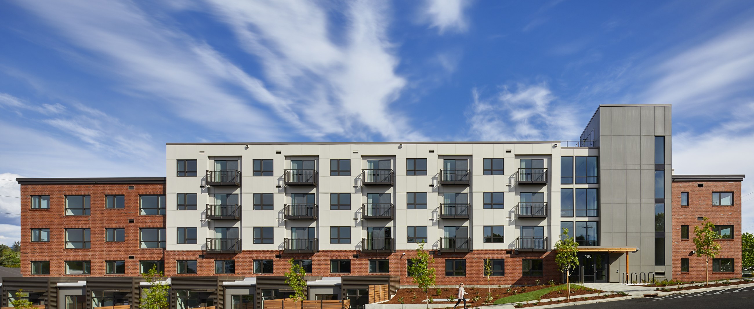Samish Commons completed multi-story affordable housing building exterior in Bellingham, Washington