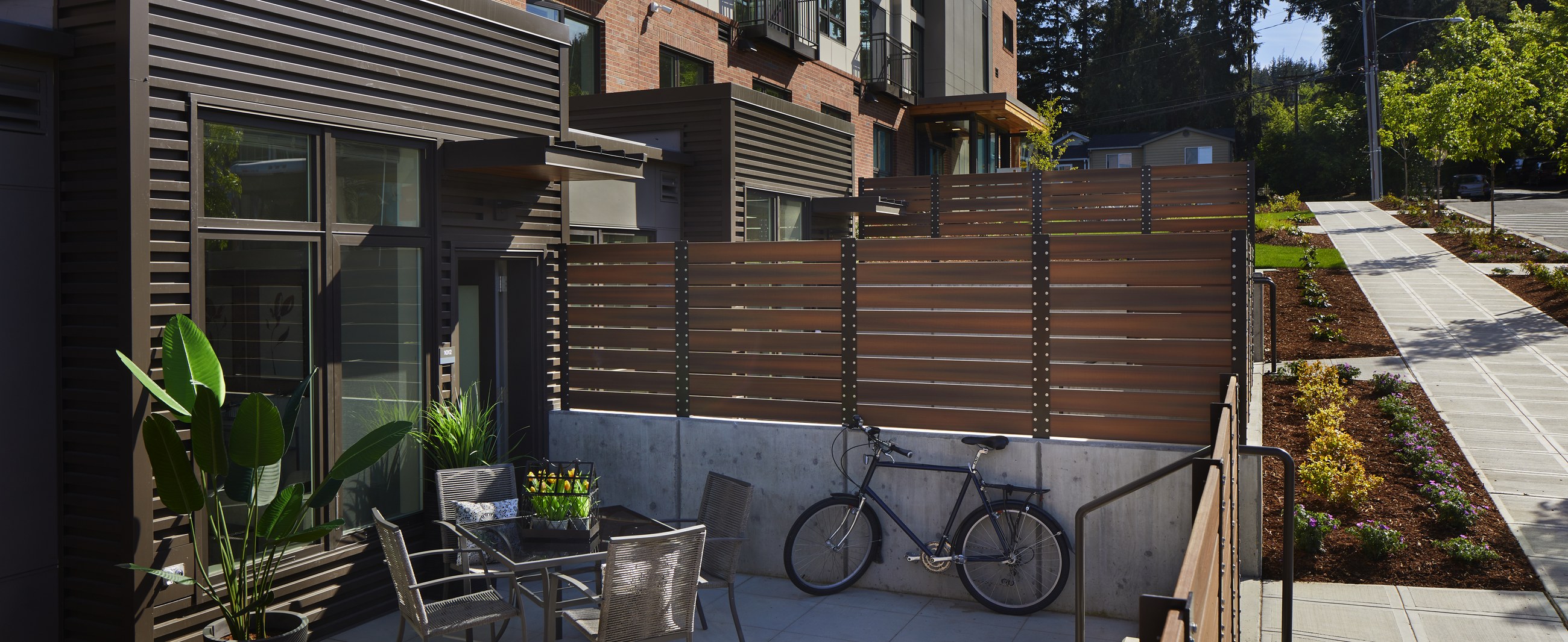 Landscaped courtyard and townhome entries at Samish Commons in Bellingham