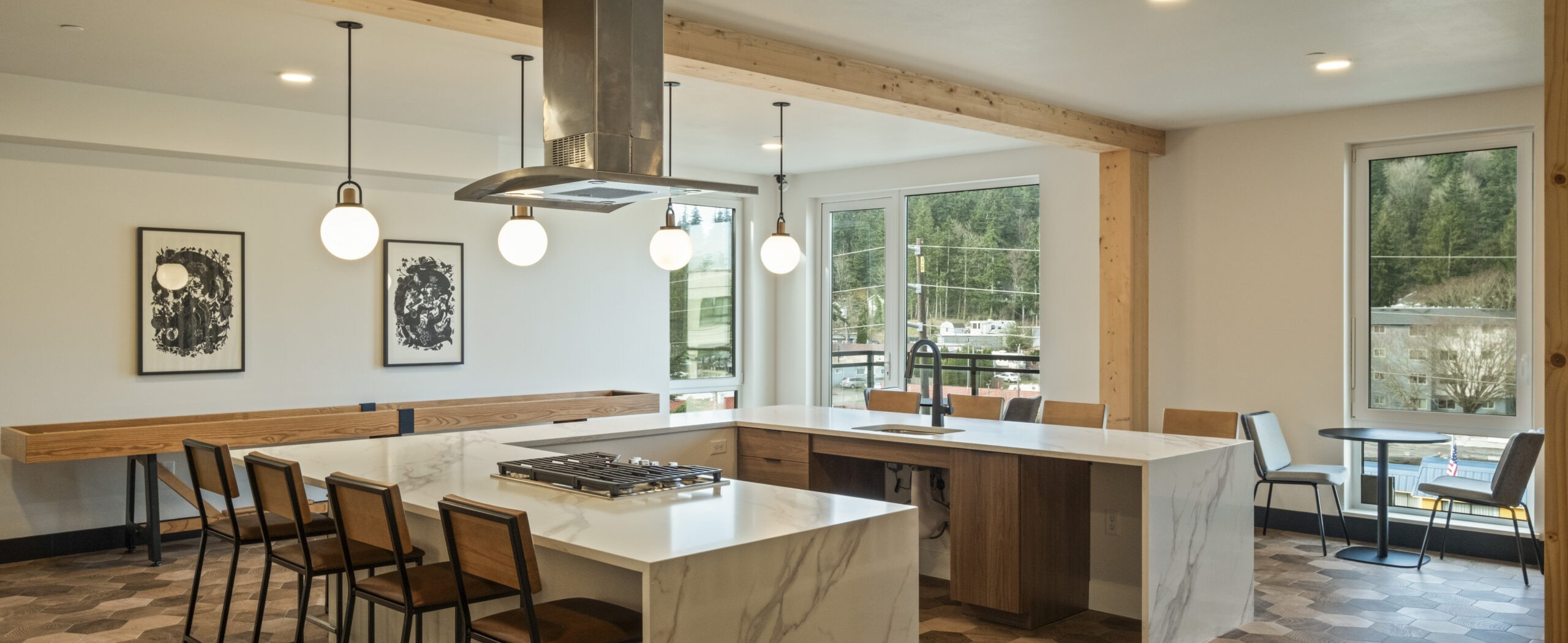 KERF Apartments common-area kitchen island and dining