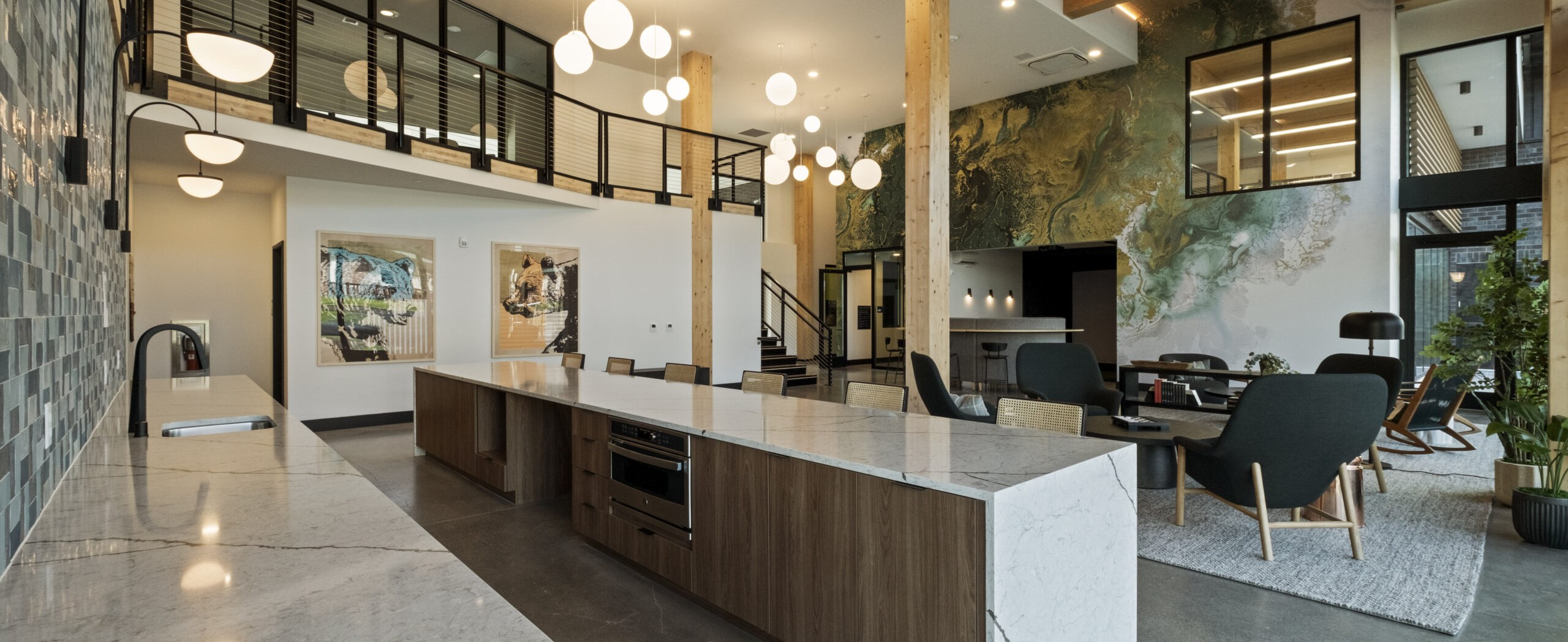 KERF Apartments kitchen and lounge with stone feature wall