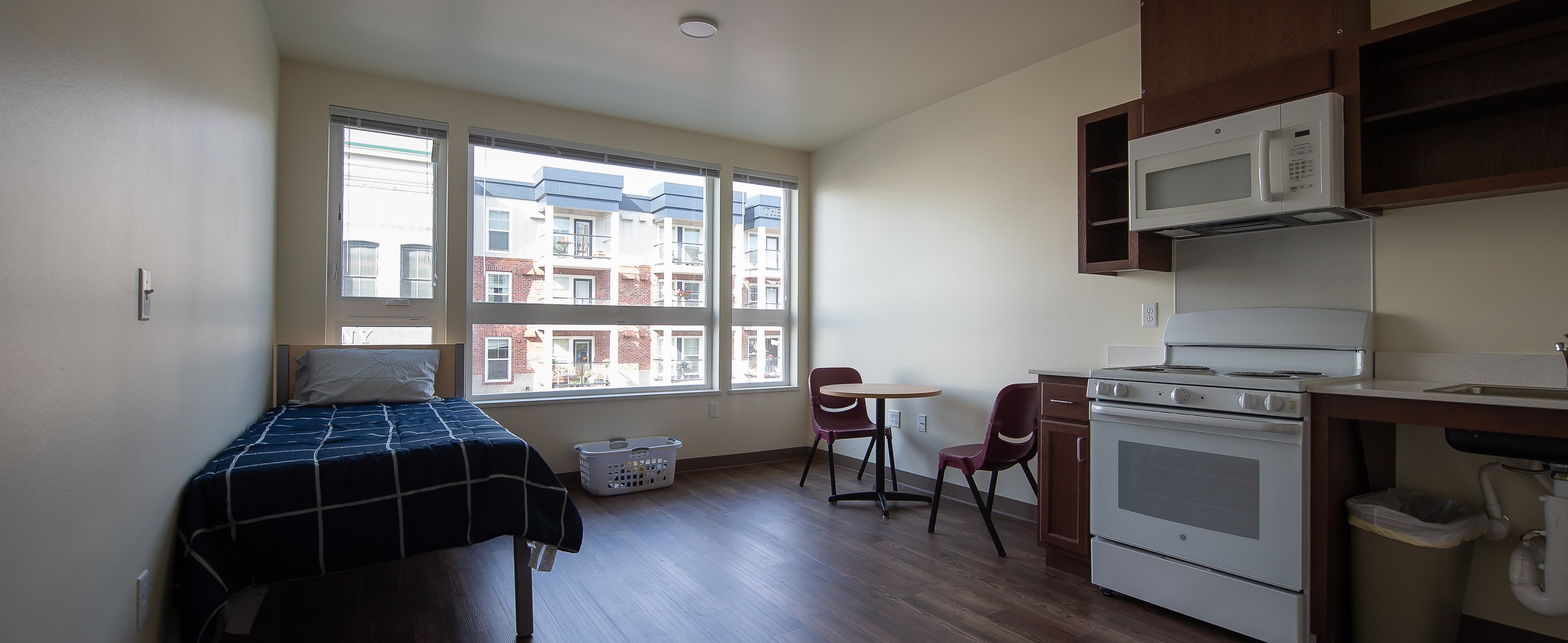 22 North studio unit with bed and kitchenette