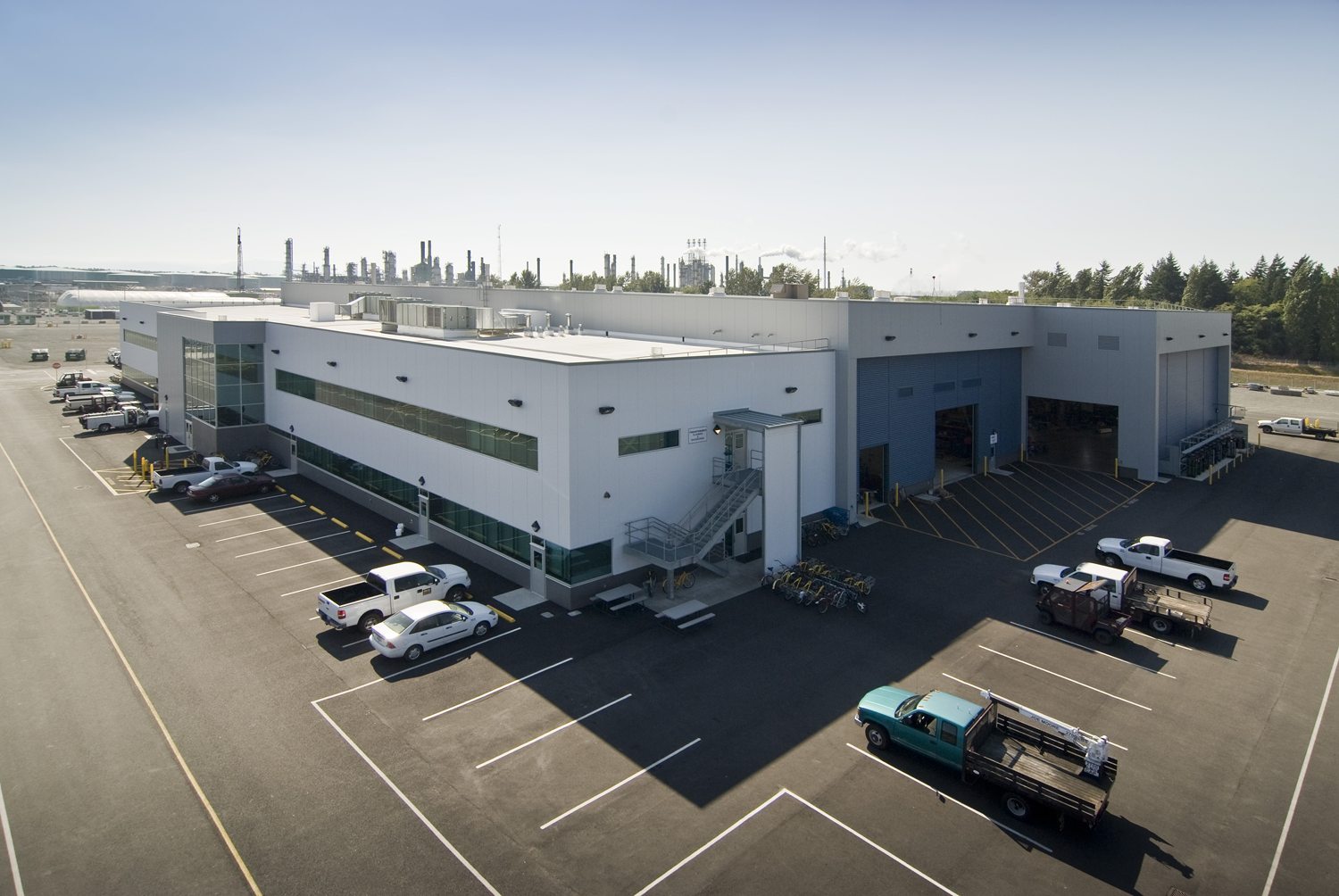Aerial view of the 20-acre BP Cherry Point maintenance facility with the refinery skyline beyond, Blaine, Washington