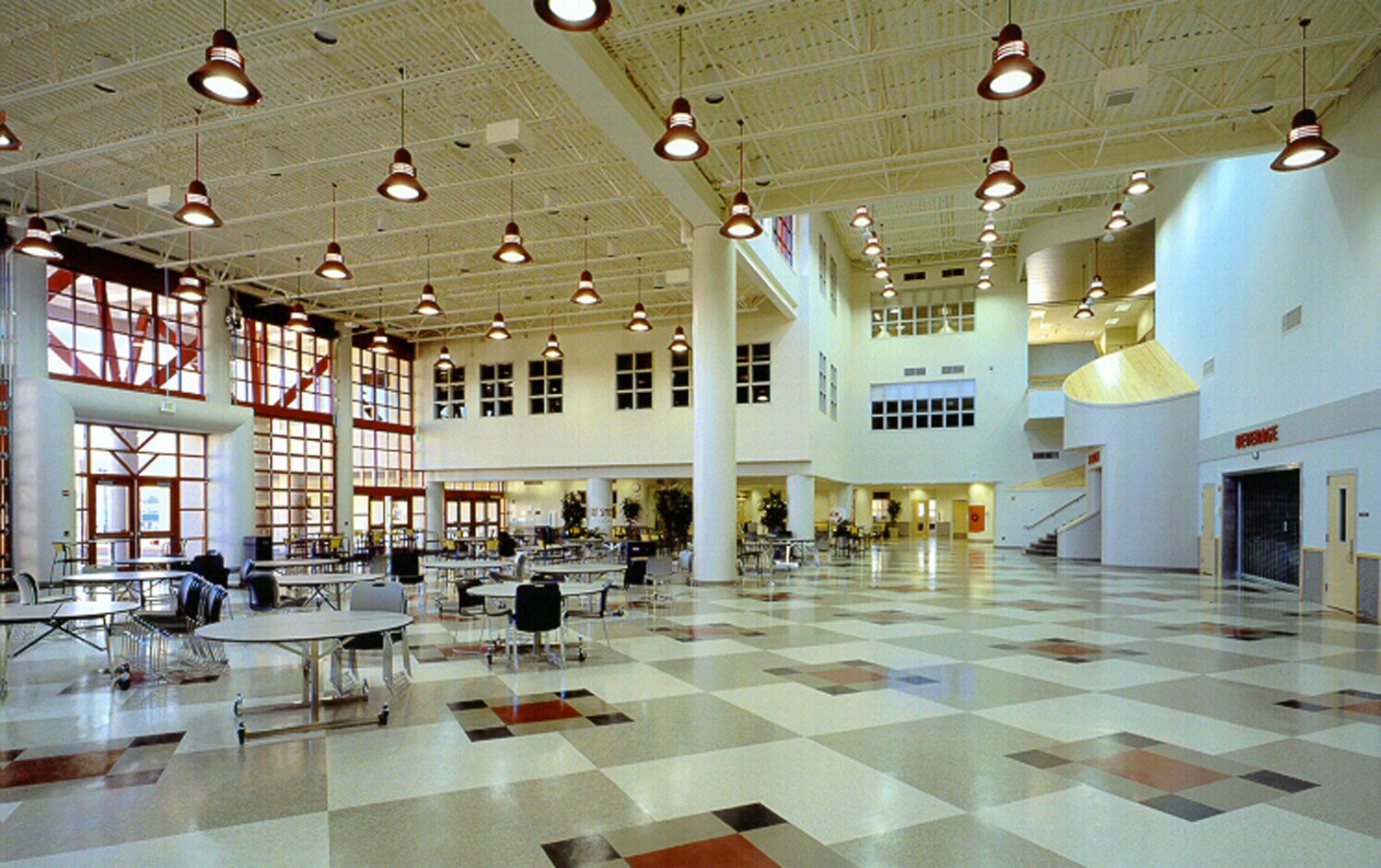 Bellingham High School three-story student commons with terrazzo floor and window wall