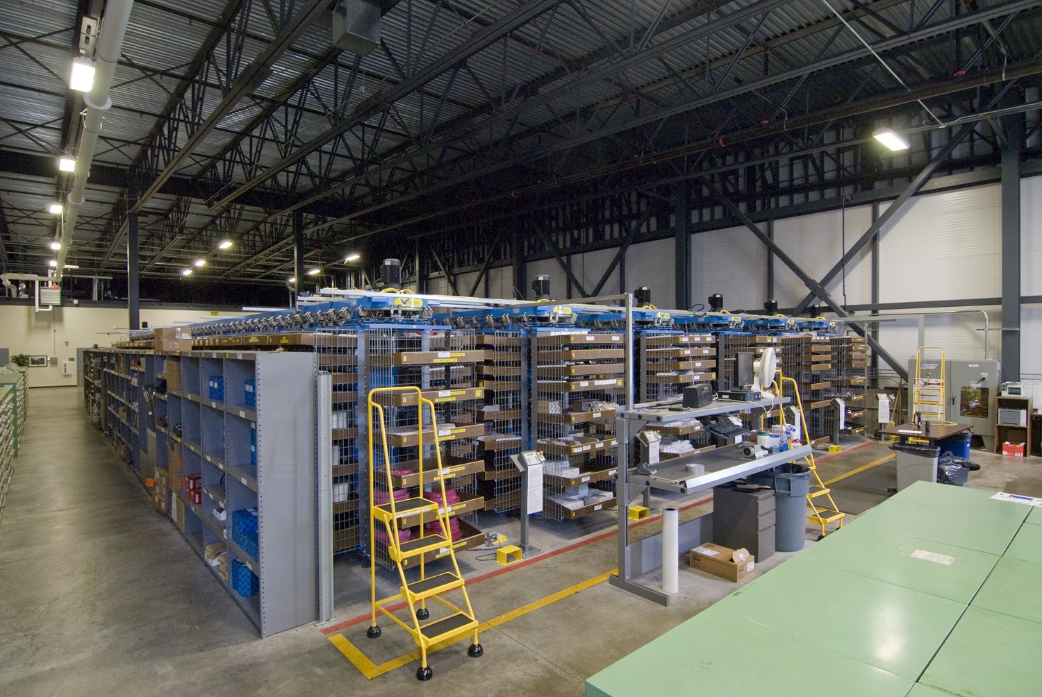 Parts warehouse interior with organized shelving at the BP Cherry Point maintenance facility