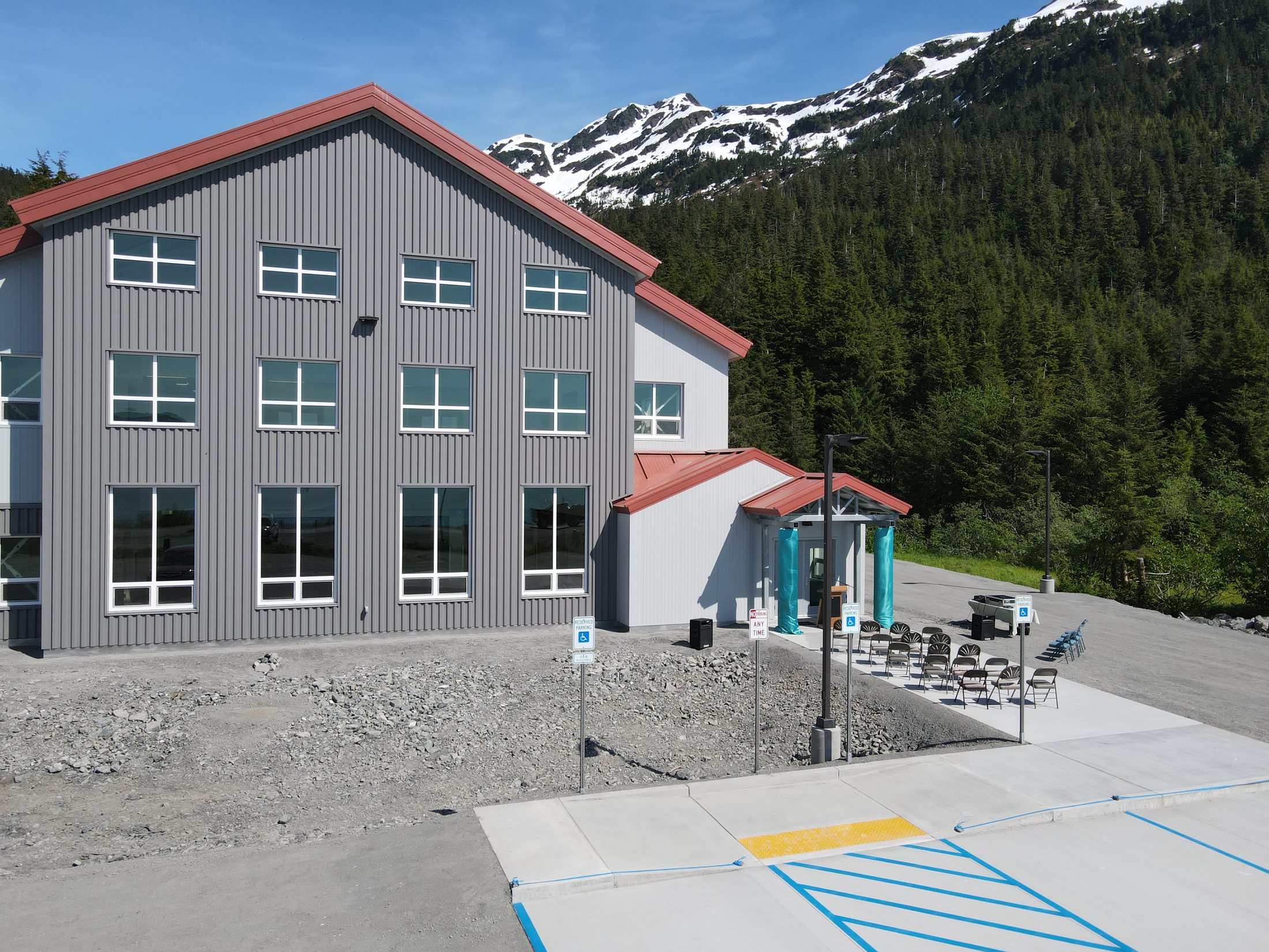 Front entry and gabled facade of the Prince William Sound Science Center campus in Cordova, Alaska