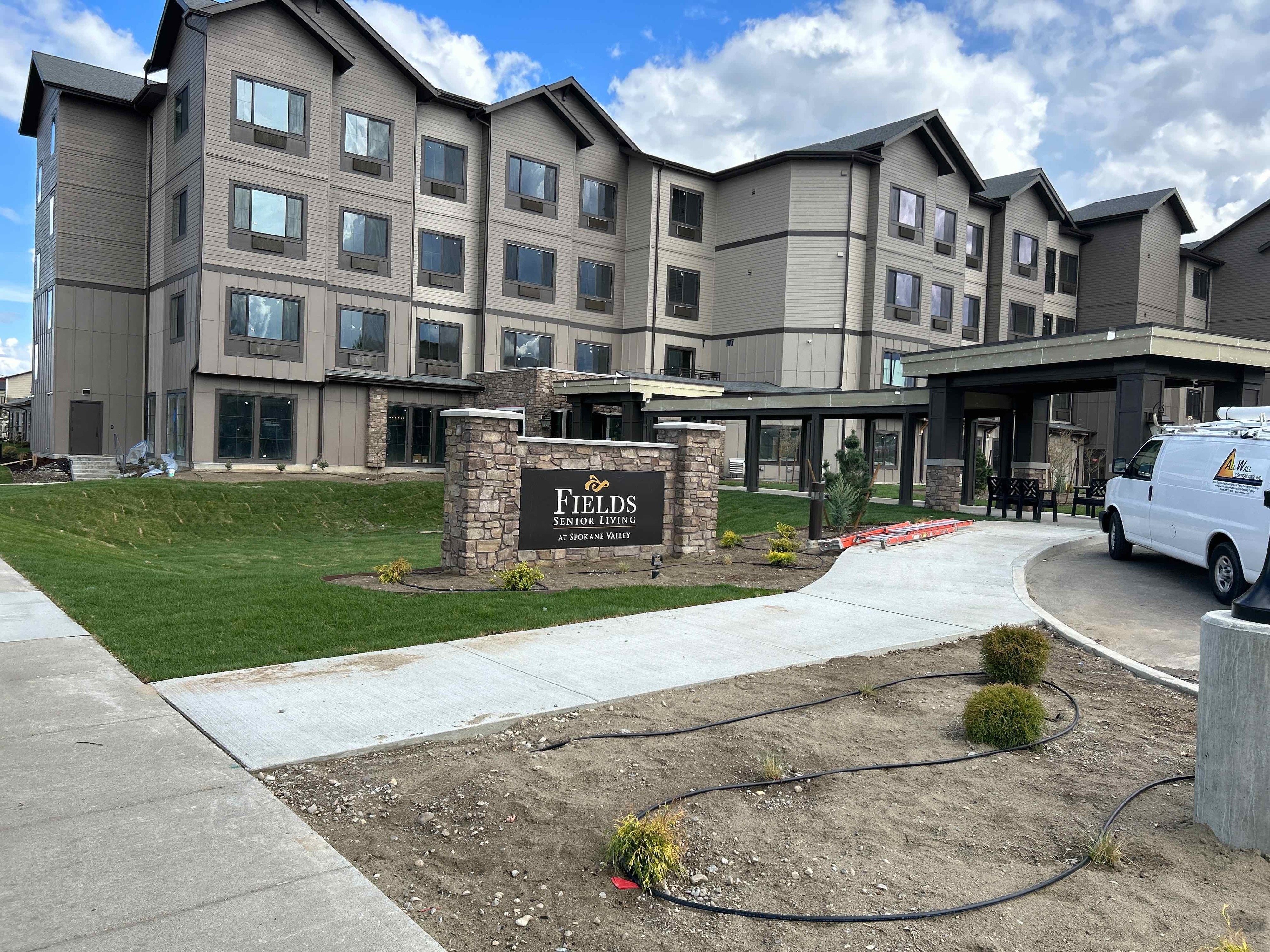 Fields Senior Living at Spokane Valley entry sign and building
