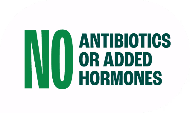 Text sign states no antibiotics or added hormones in bold green and black letters.