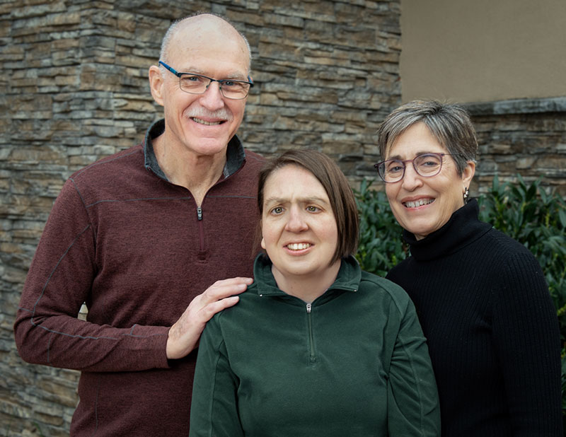 Beate and Tim Sass, founders of Better Living Together, with their daughter who has an intellectual and developmental disability