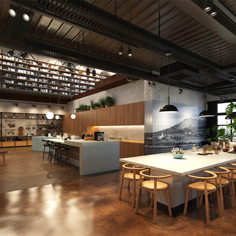 Modern kitchen and dining area with large white island, wooden stools, pendant lights, built-in bookshelves, and a wall mural of a mountain landscape.