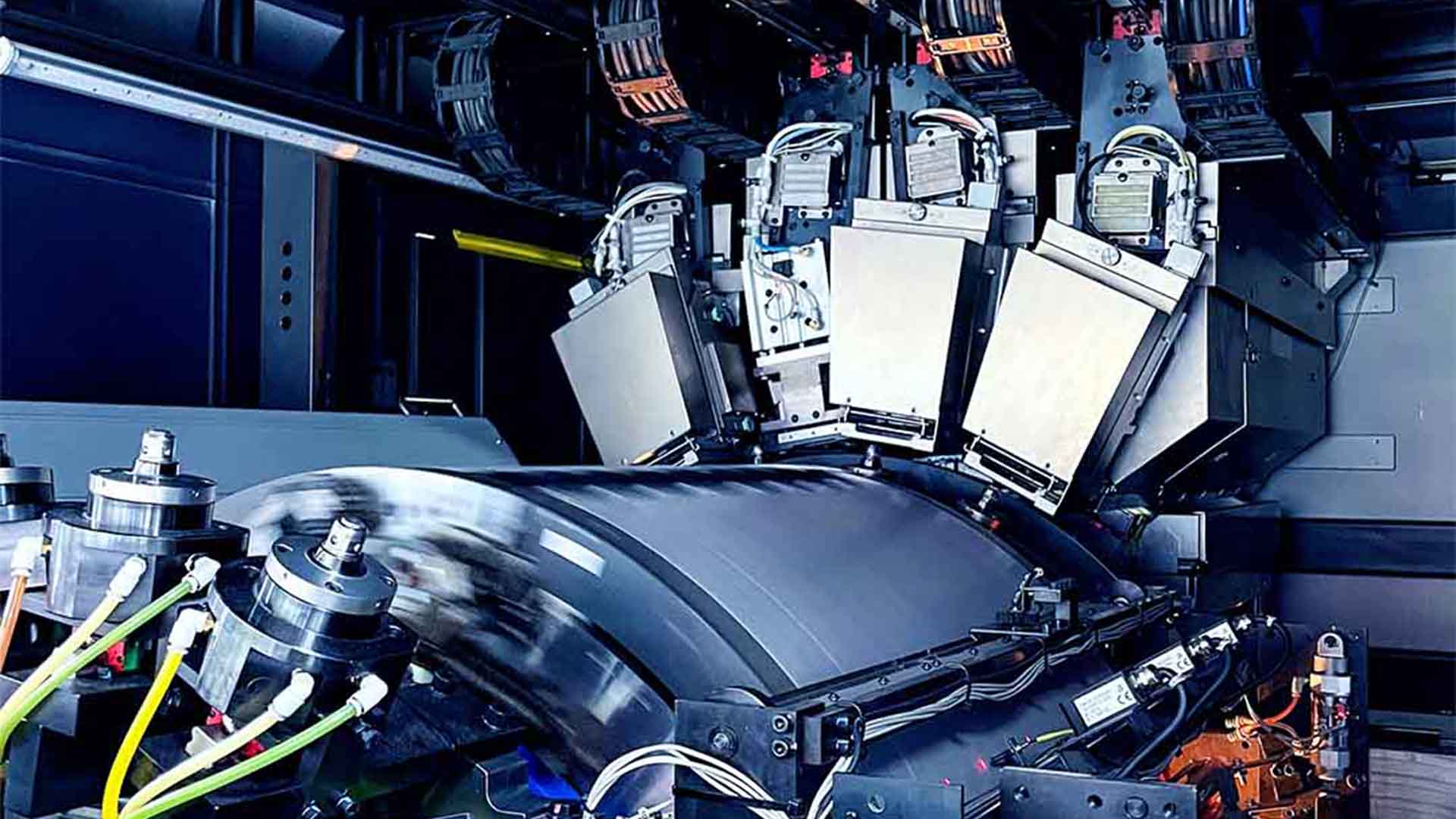 Large commercial offset printing press in operation showing high-volume production capabilities at Mainprint's printing facility